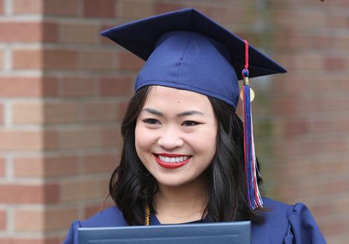 South graduate in cap and gown.